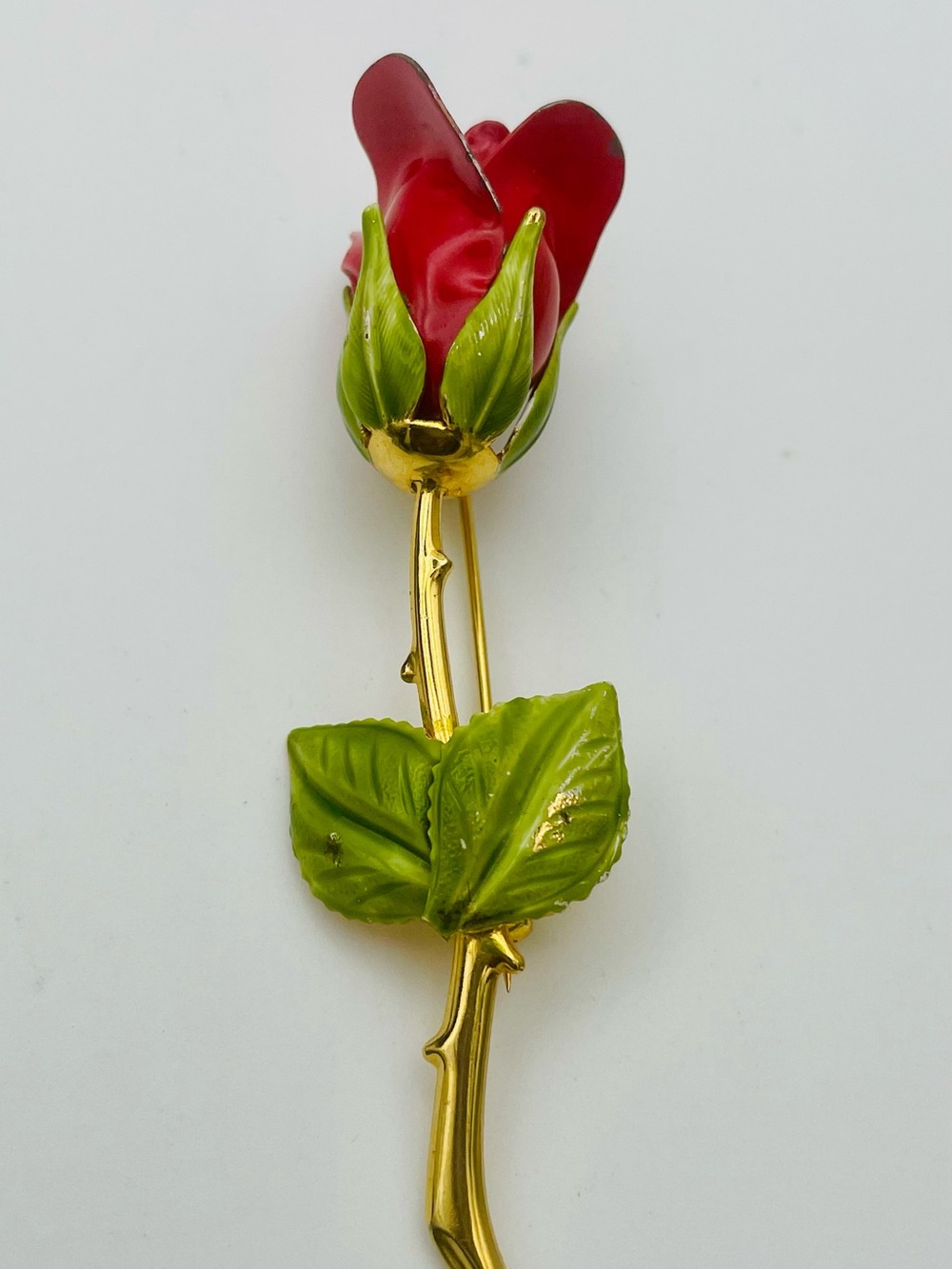 Gold-Tone Red Rose Brooch with Green Enamel Leaves